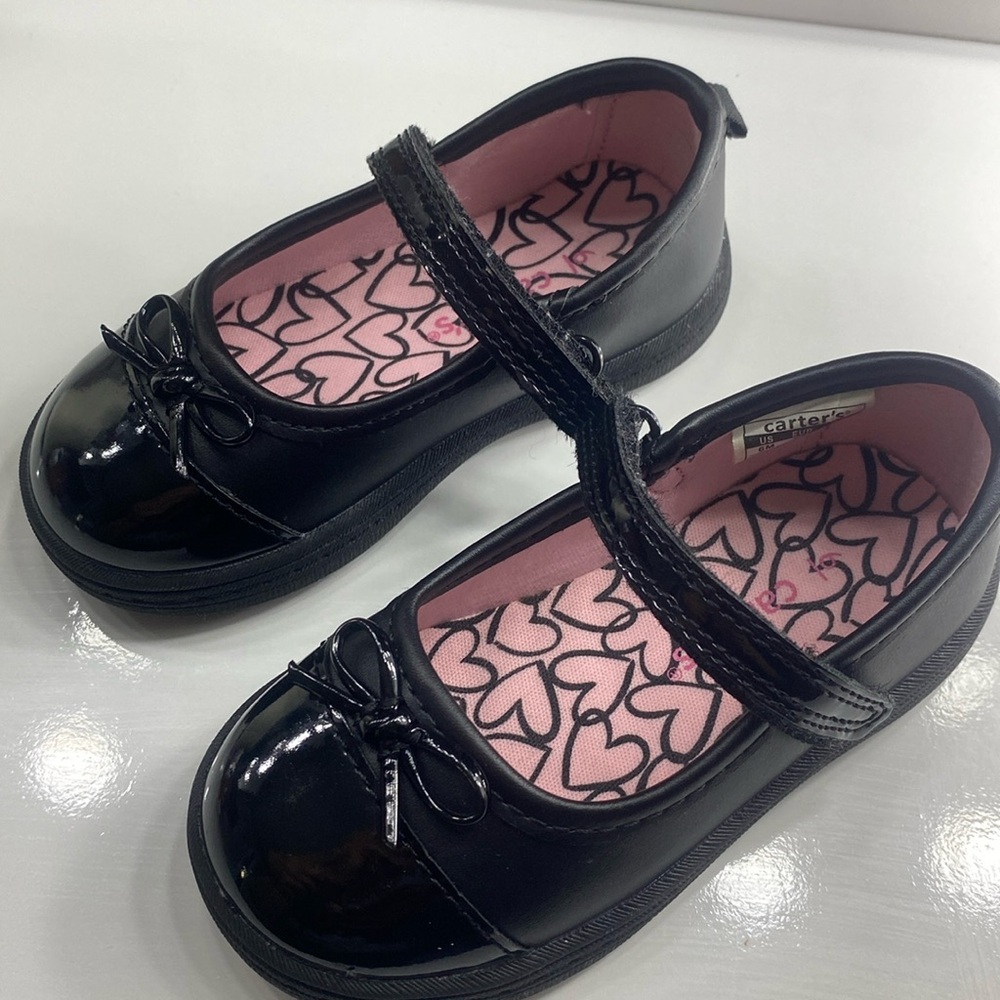 Black shoes with bows